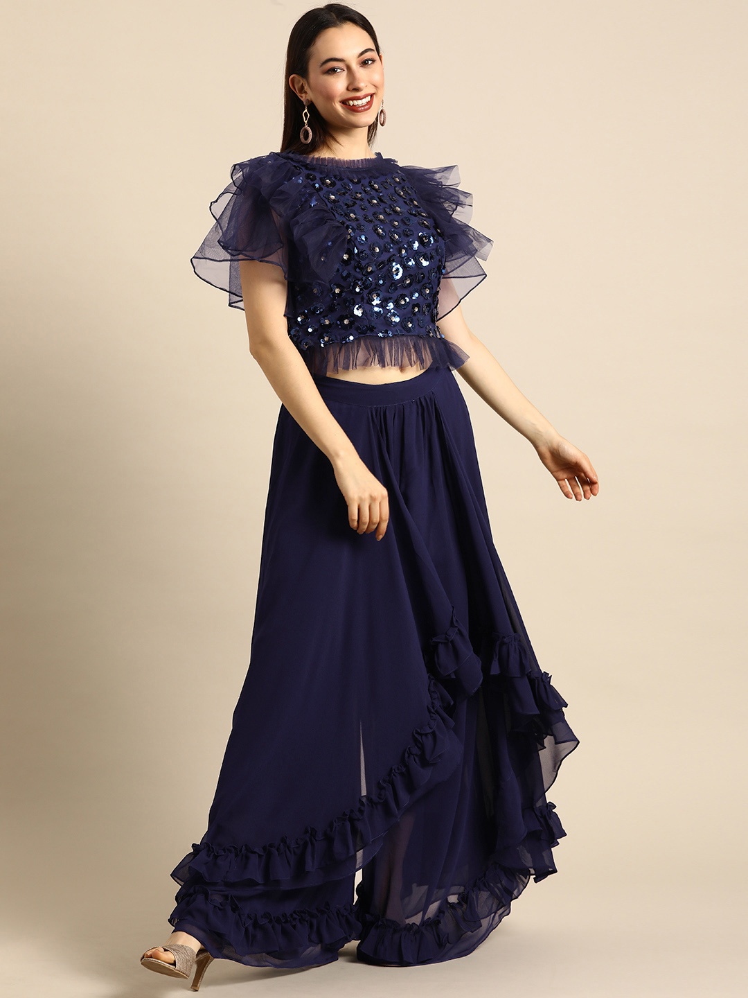 

Tikhi Imli Women Blue Ruffle Sleeve Embellished Sequined Top with Frilled Palazzos
