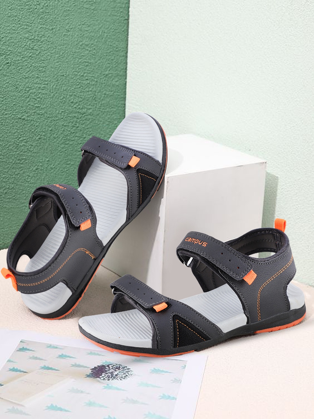 

Campus Men Grey & Orange Textured Sports Sandals