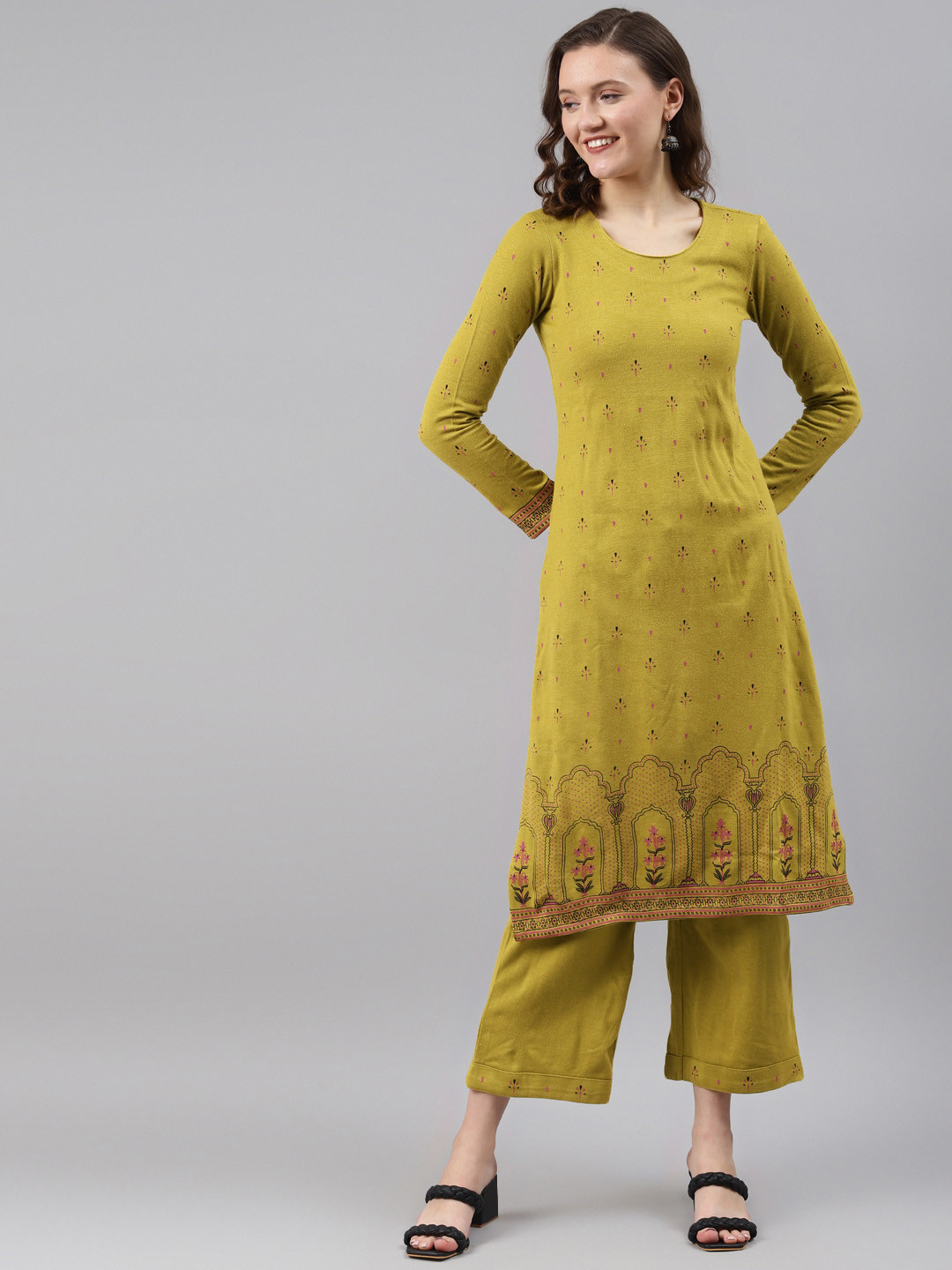 

Rangriti Women Green Printed Regular Kurta with Palazzos