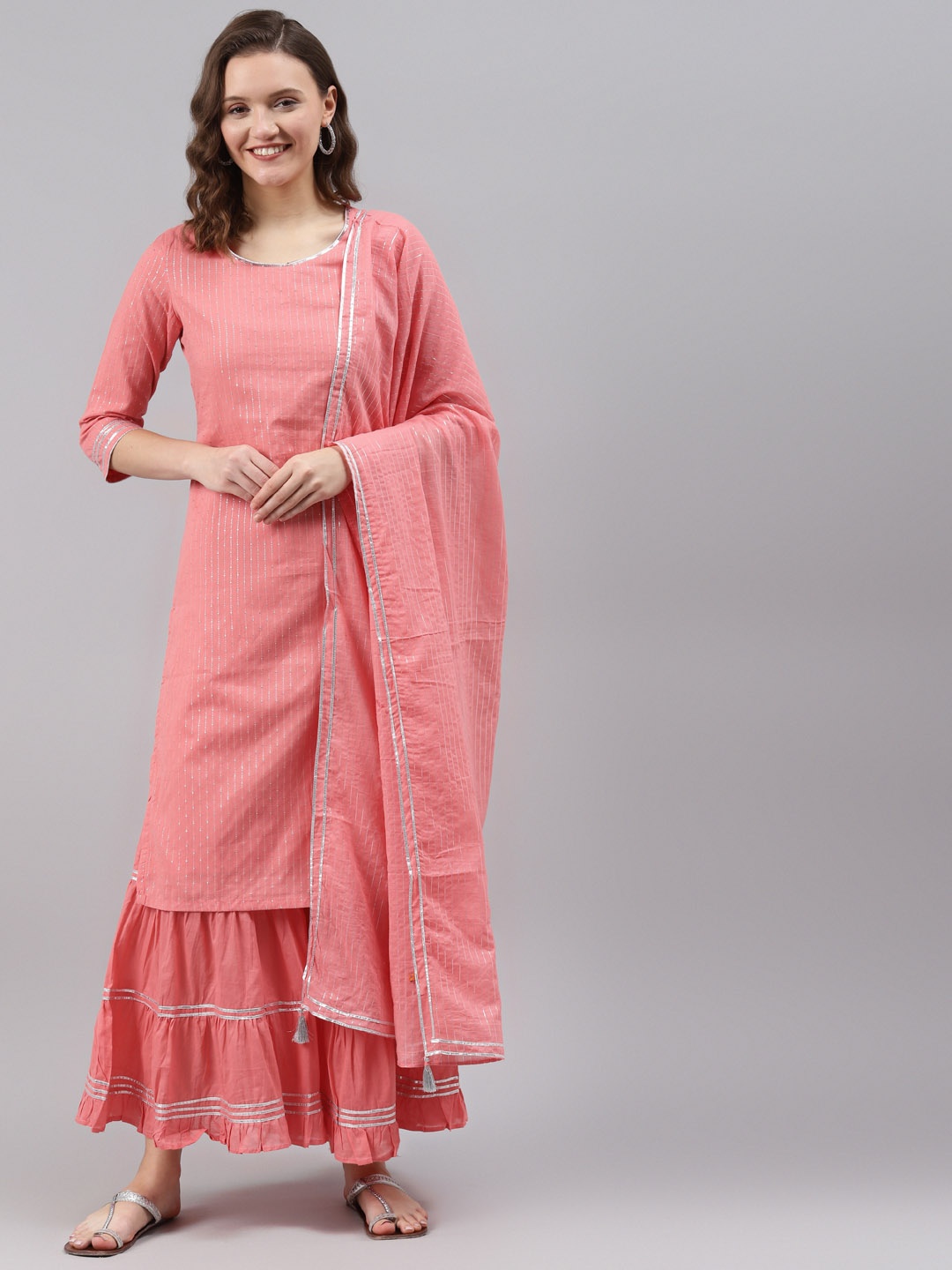 

Rangriti Women Peach-Coloured Striped Regular Kurta with Sharara & With Dupatta