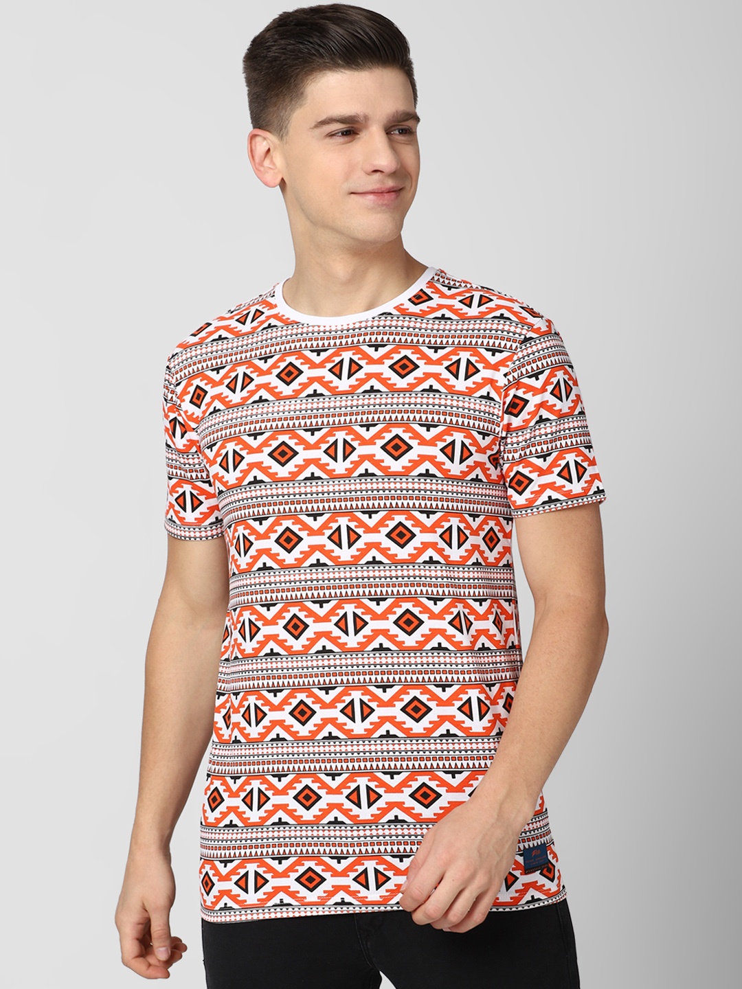 

Peter England Casuals Men Orange White Printed Slim Fit Pure Cotton T-shirt