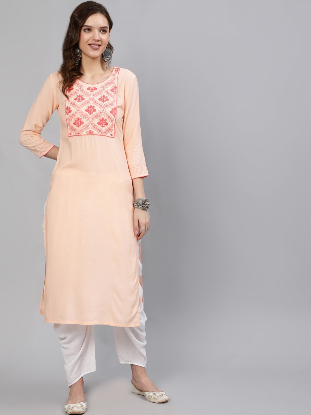 

Nayo Women Peach-Coloured Floral Yoke Design Thread Work Kurta