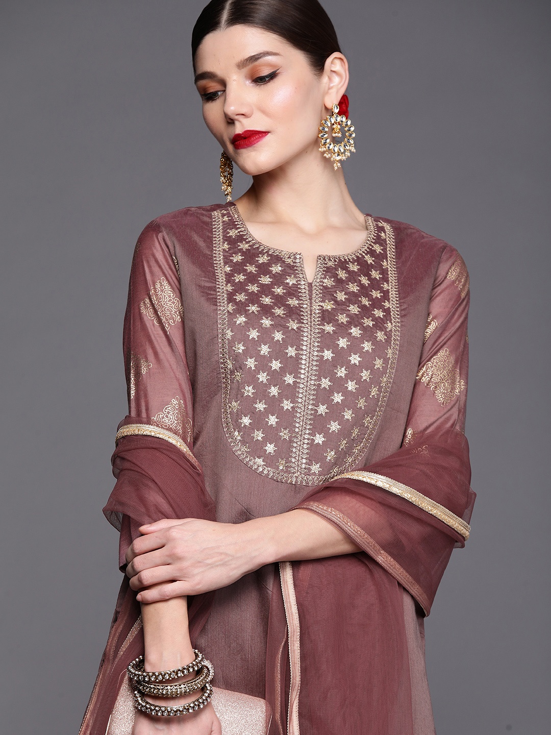 

Inddus Women Mauve Ethnic Motifs Yoke Design Chanderi Cotton Kurta with Palazzos & Dupatta