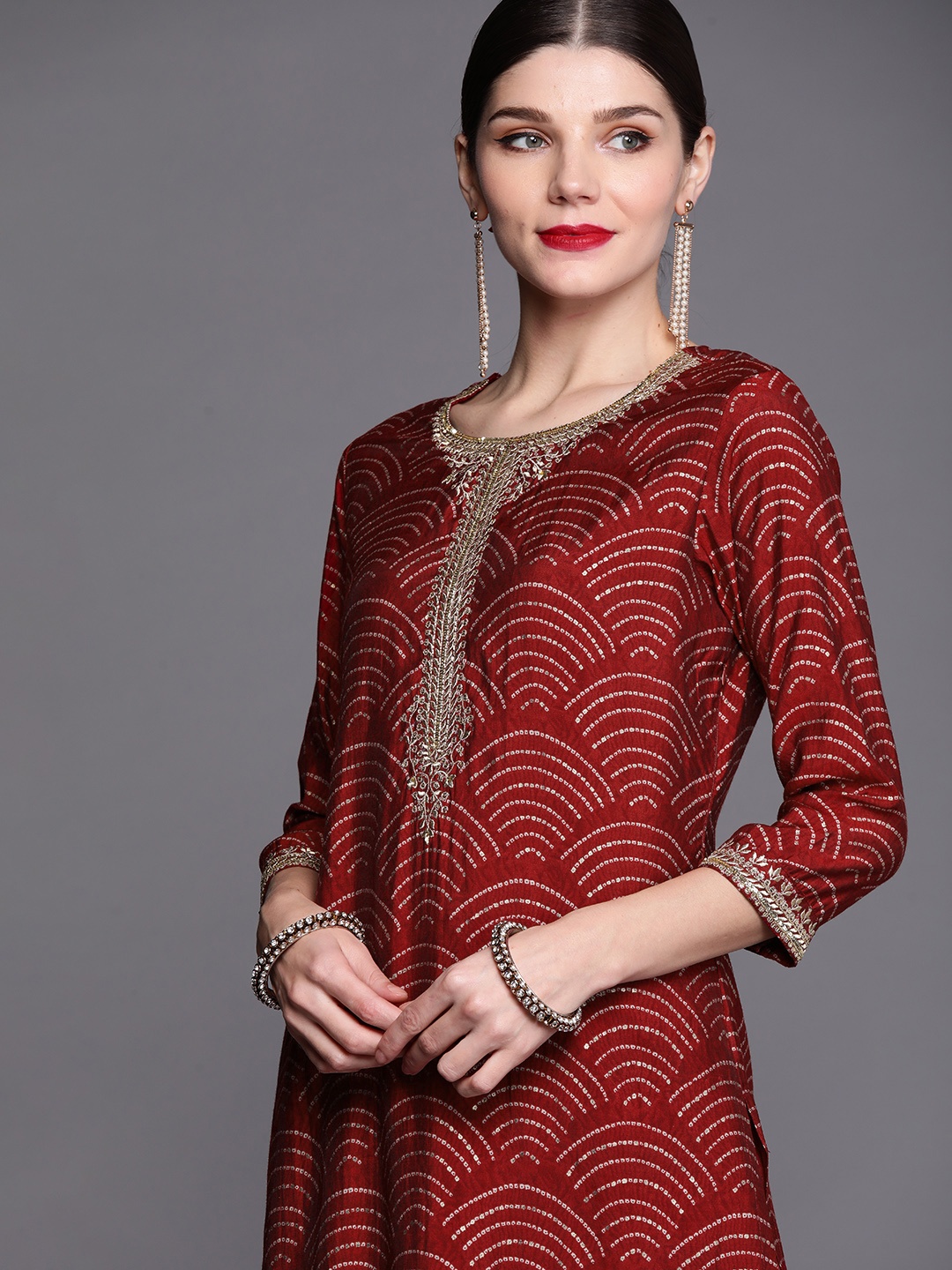 

Inddus Women Maroon Bandhani Embroidered Regular Kurta with Trousers