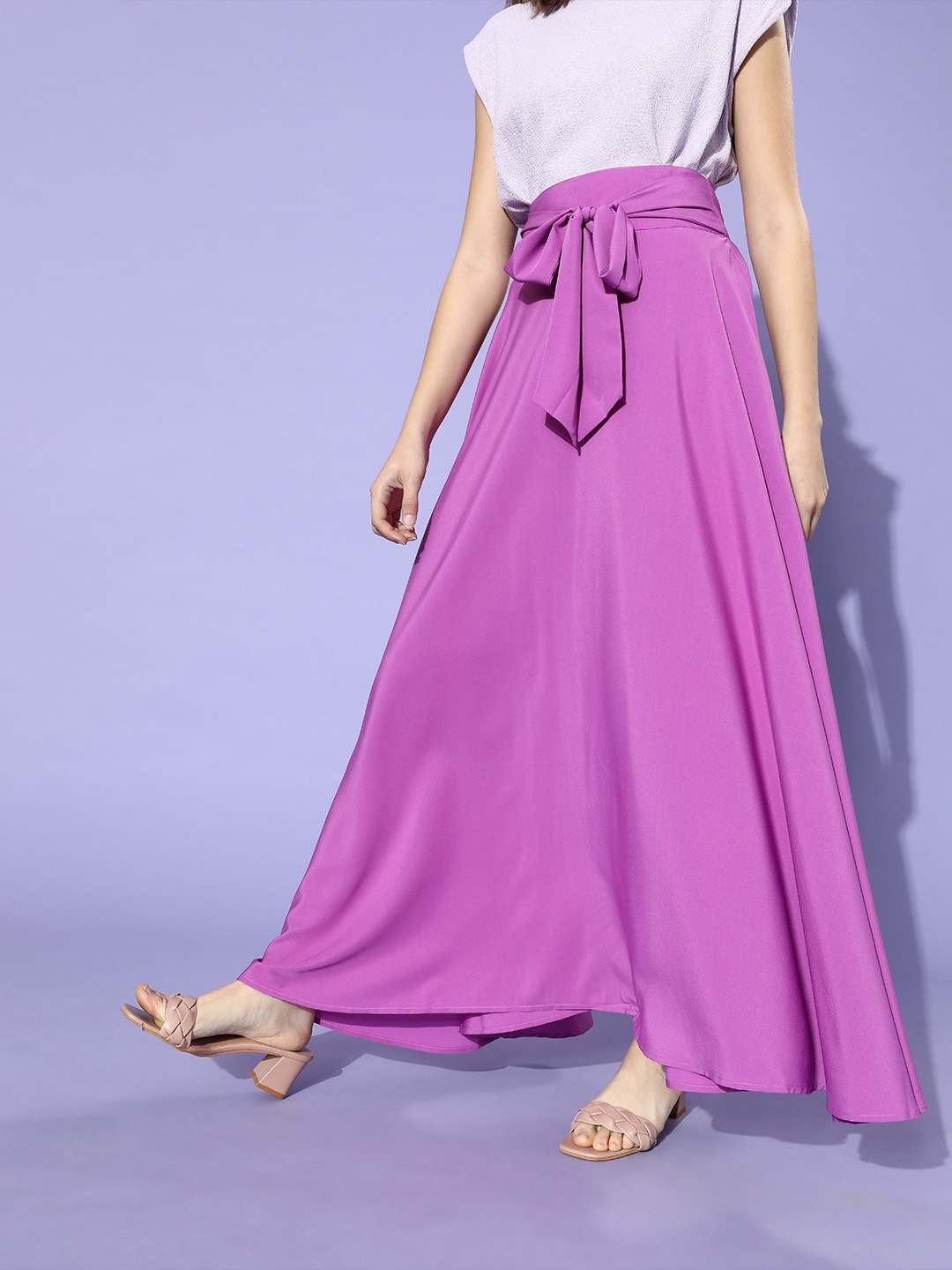 

Berrylush Purple Solid Flared Maxi Skirt with Waist Tie-ups detail