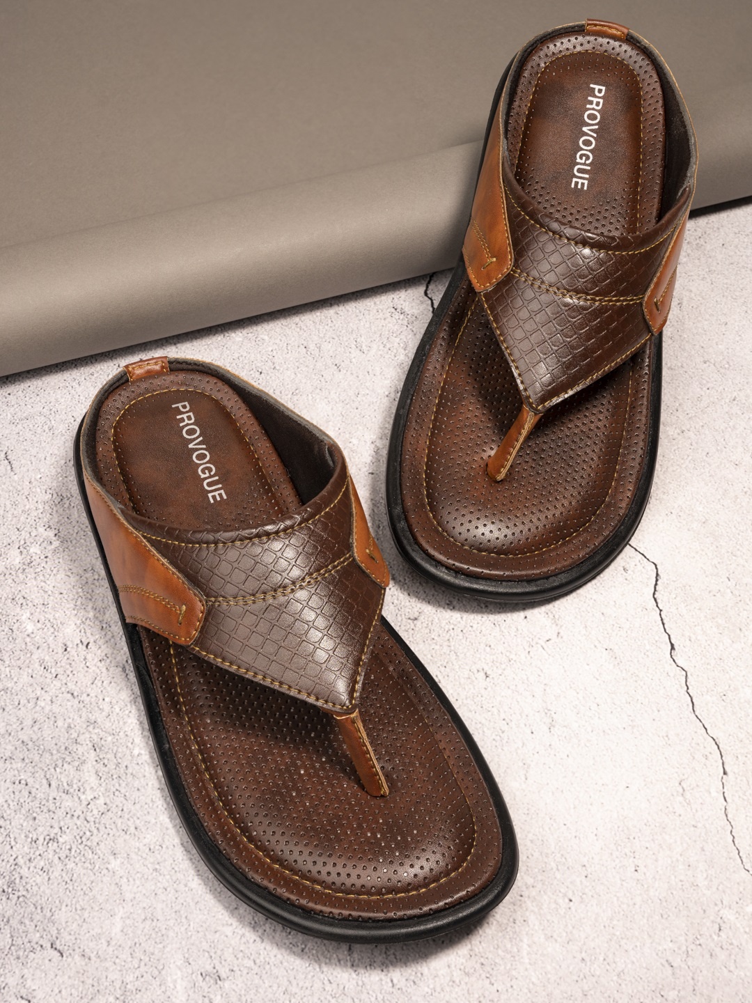 

Provogue Men Brown & Tan Self Design Slip-On Flip Flops