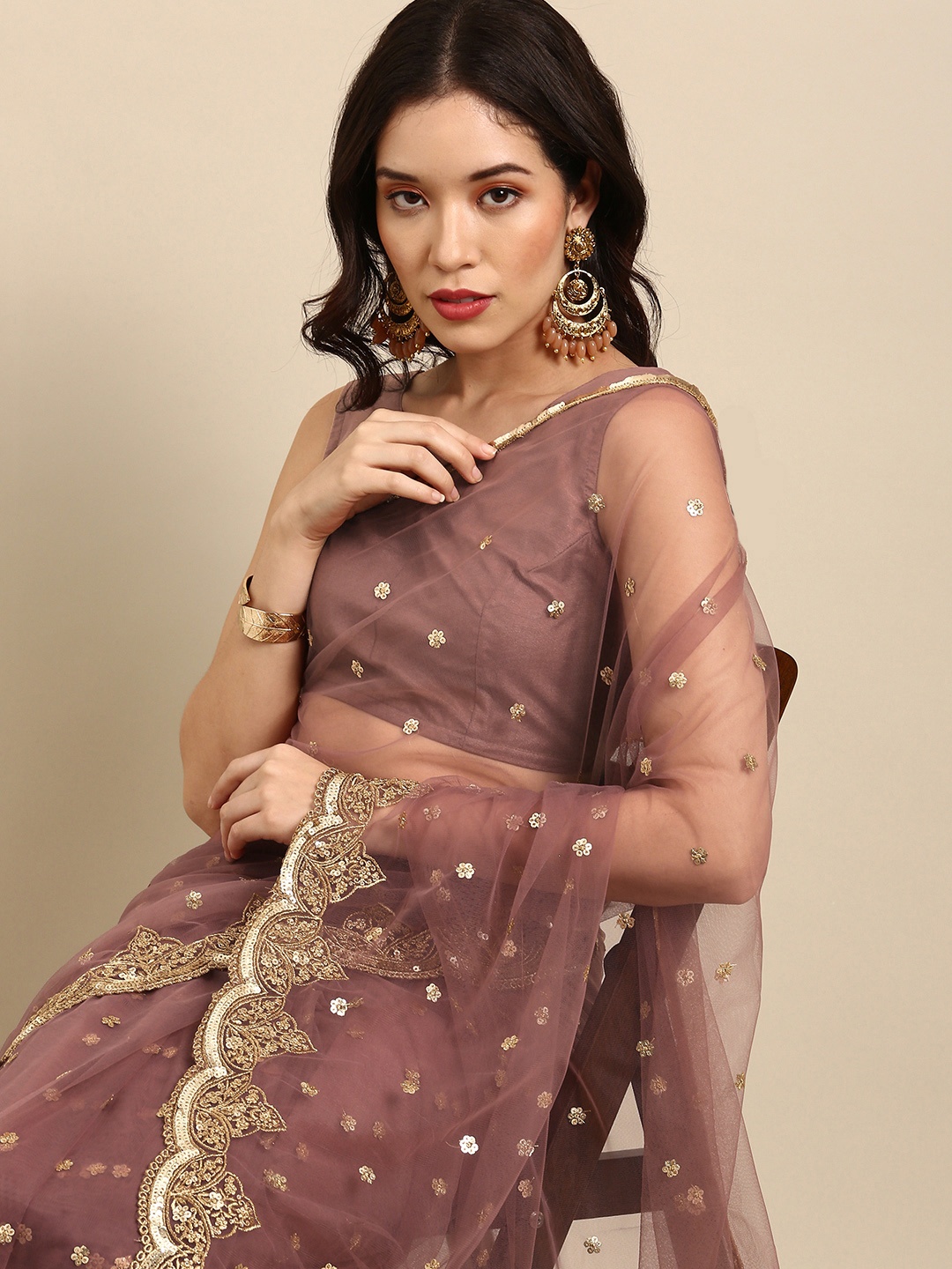 

Sangria Pink & Gold-Toned Ethnic Motifs Sequinned Net Saree