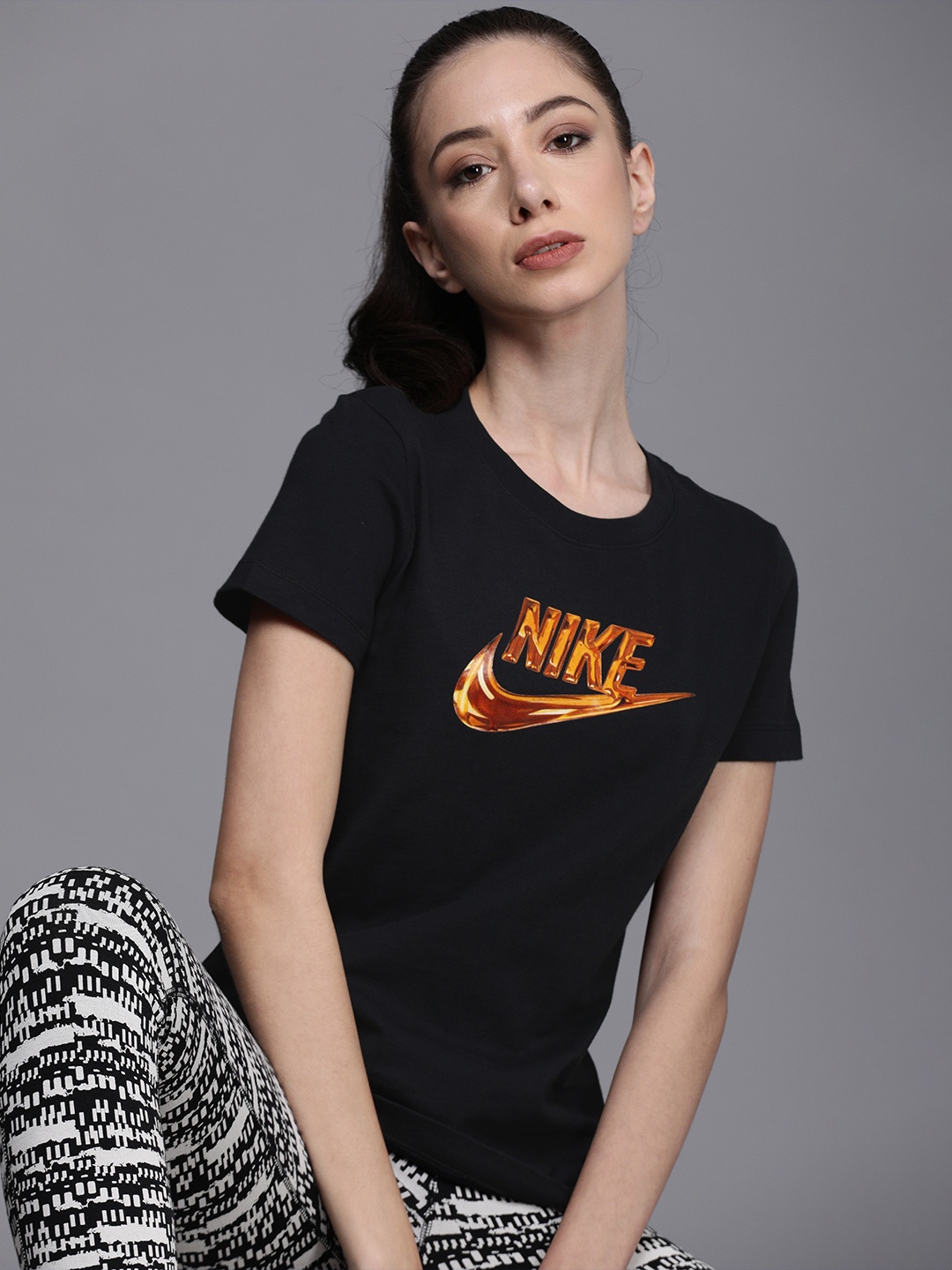 

Nike Black Brand Logo NSW TEE SS LX Regular Top
