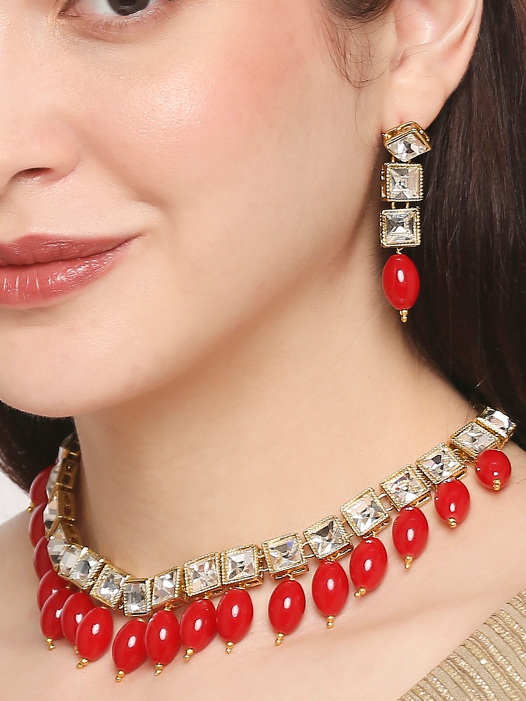 

OOMPH Gold-Toned & Red Kundan-Studded & Beaded Jewellery Set