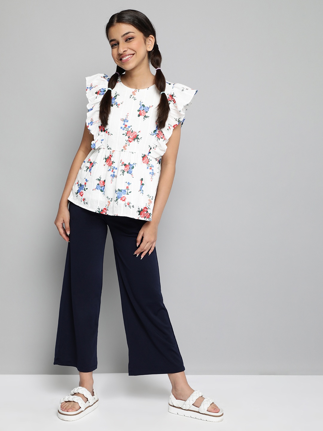 

JUSTICE Girls White Printed Peplum Top with Navy Blue Trousers