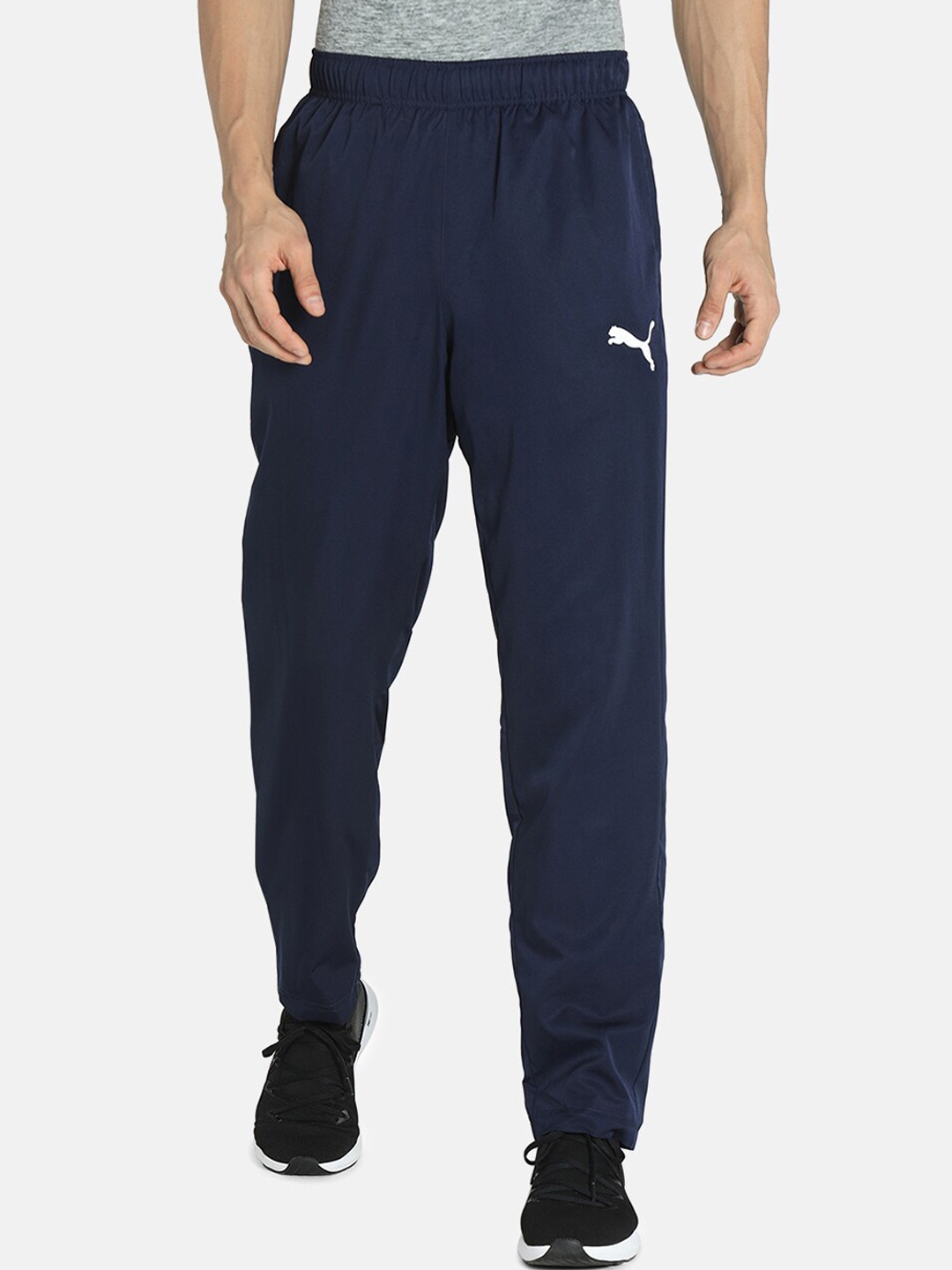 

Puma Men Navy Blue Solid Regular Fit Sustainable Track Pants with dryCELL Technology