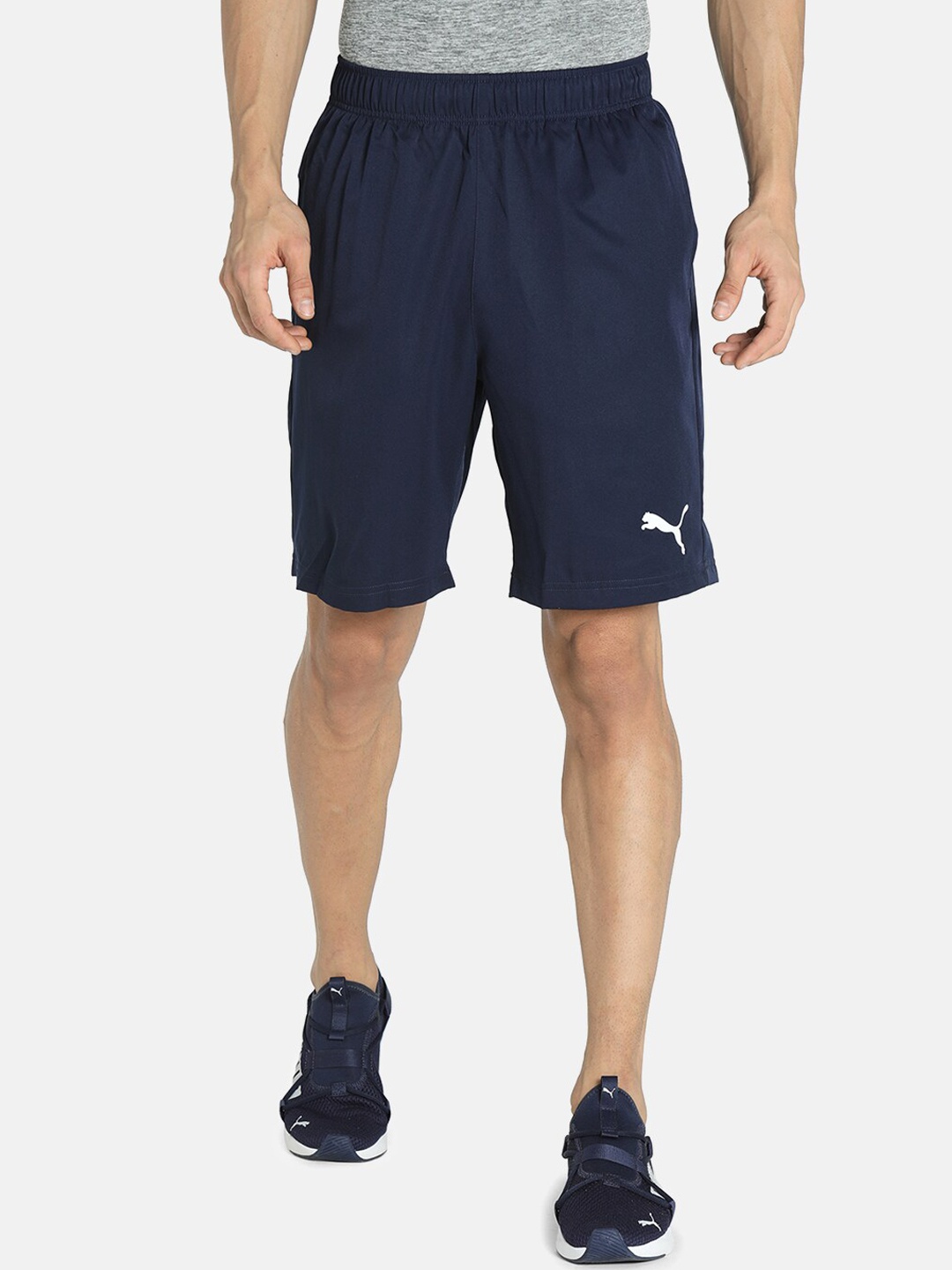 

Puma Men Navy Blue & White Active Woven 9" Regular Fit Sustainable Shorts