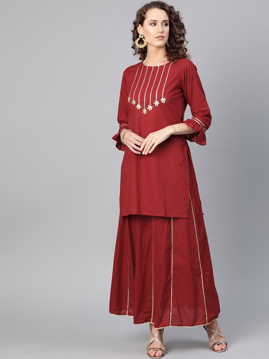 

Bhama Couture Women Maroon & Gold-Toned Embellished Kurta with Skirt