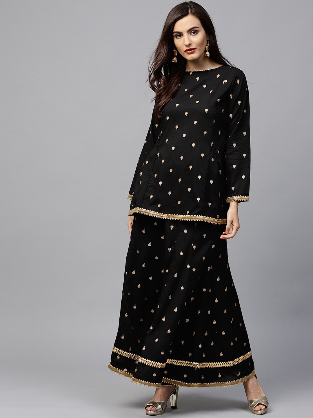 

Bhama Couture Women Black & Golden Printed Kurti with Palazzos