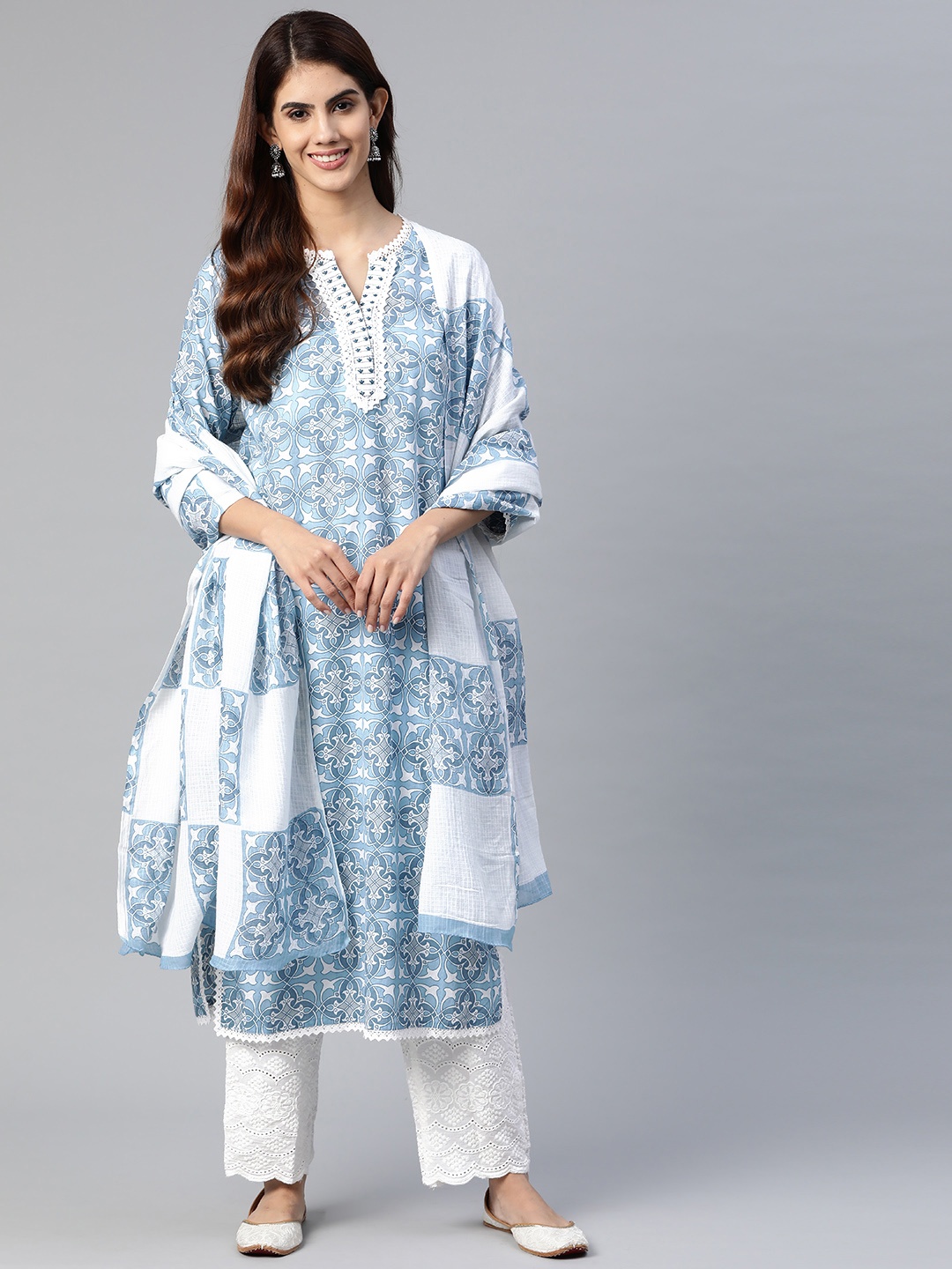 

Yuris Women Blue Floral Printed Regular Thread Work Pure Cotton Kurta with Palazzos & With Dupatta