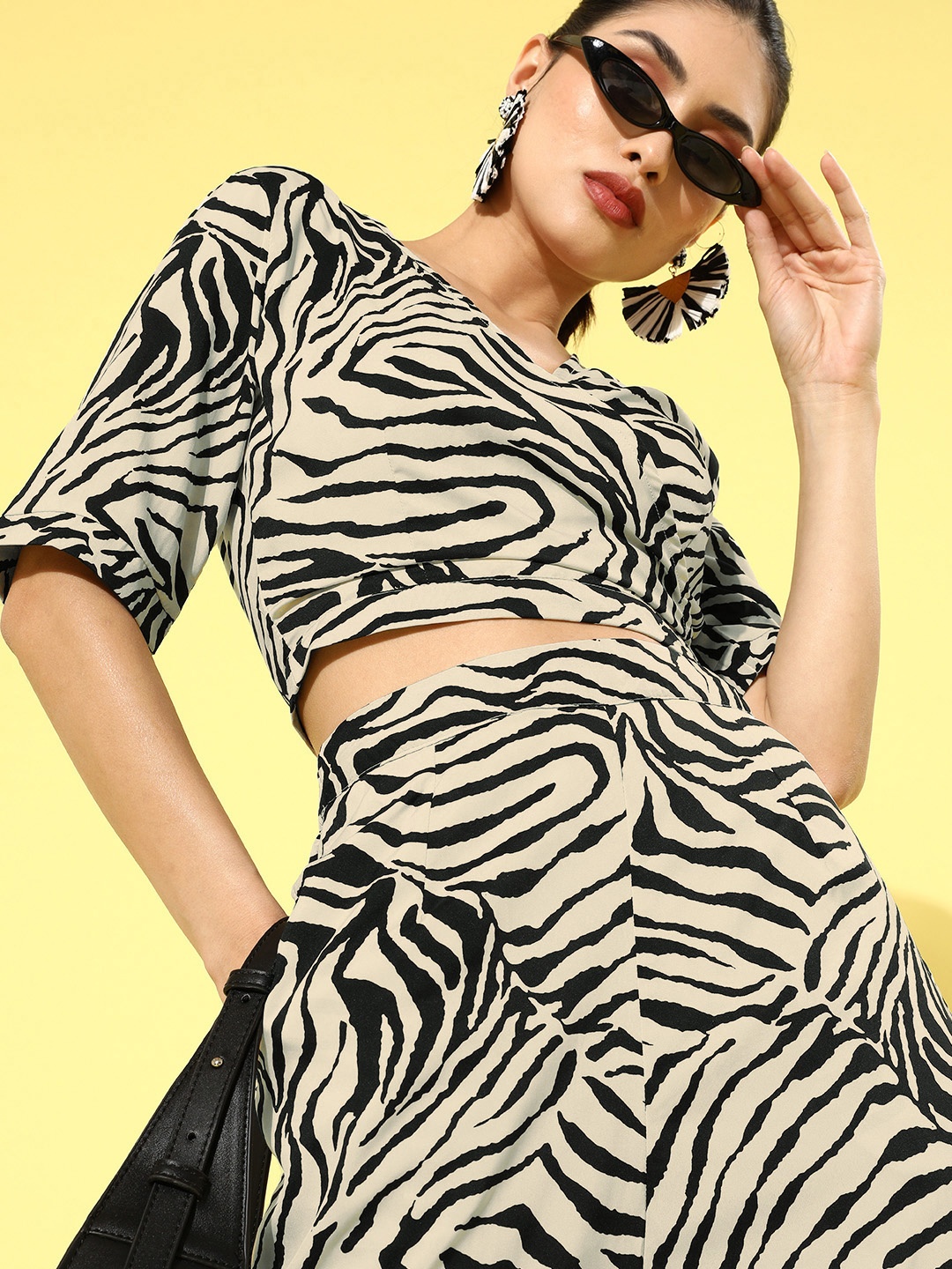 

The Vanca Women Stylish Black Printed Top with Skirt