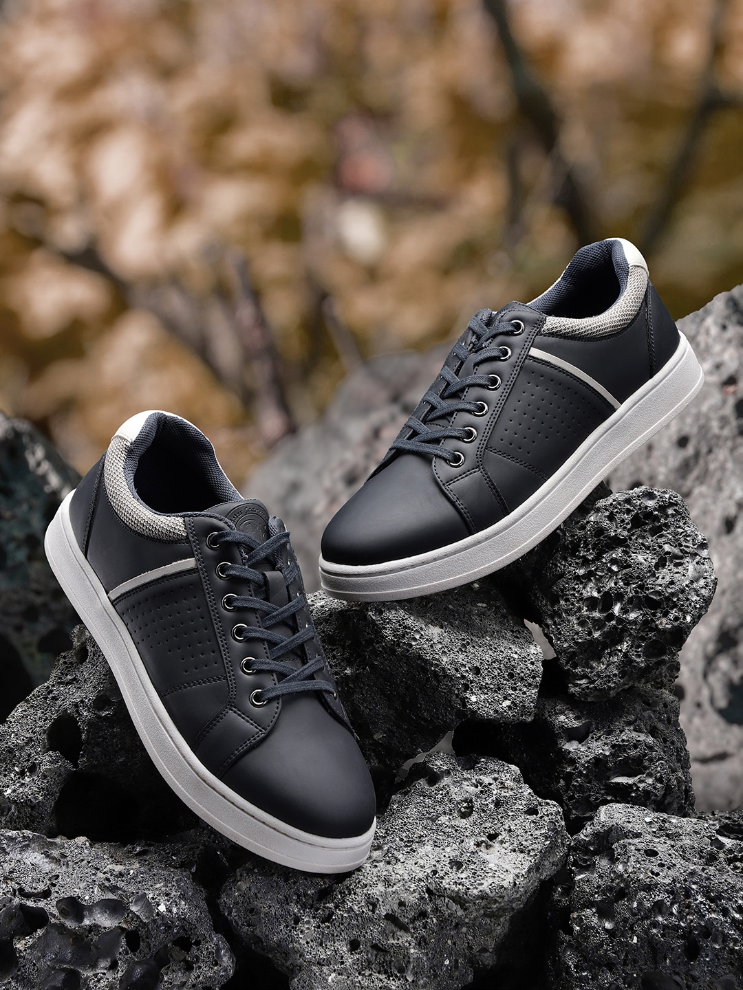 

The Roadster Lifestyle Co Men Navy Blue Solid Sneakers