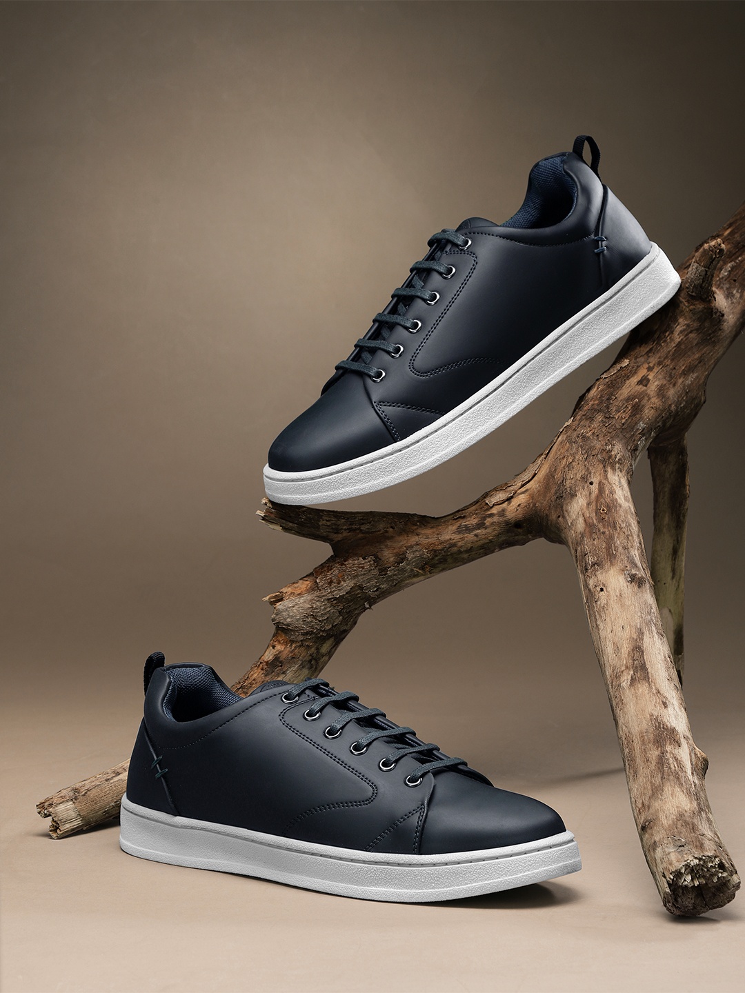 

The Roadster Lifestyle Co Men Navy Blue Solid Sneakers