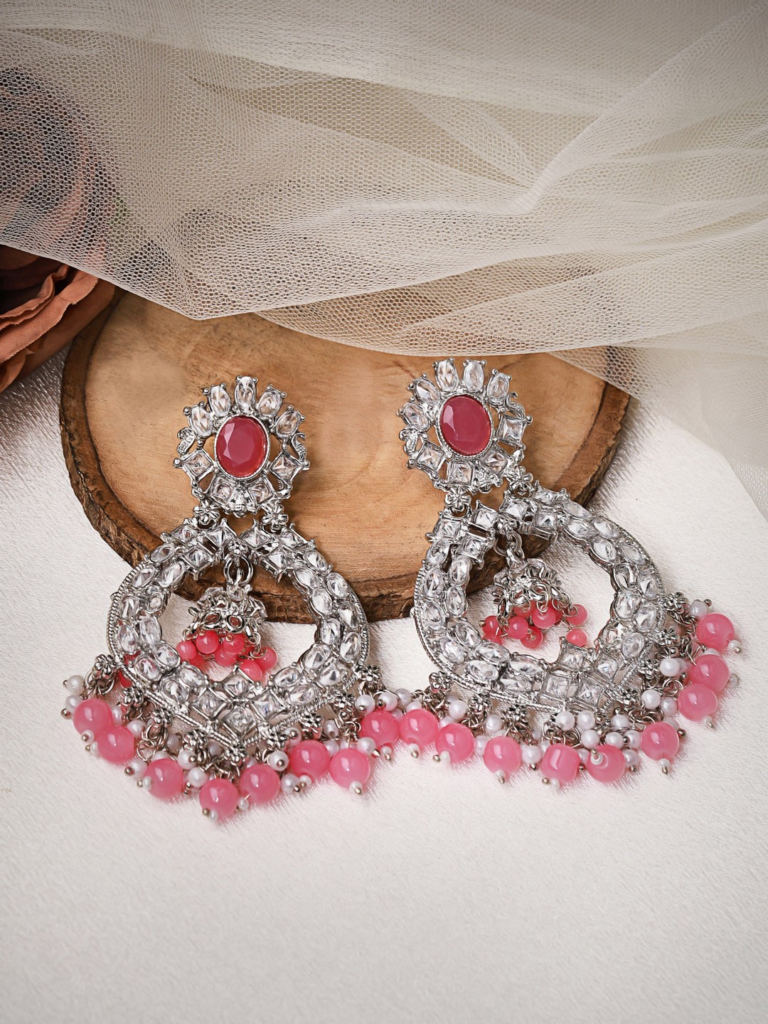 

Rubans Silver-Toned & Coral Alloy Silver Plated Handcrafted Crescent Shaped Chandbalis