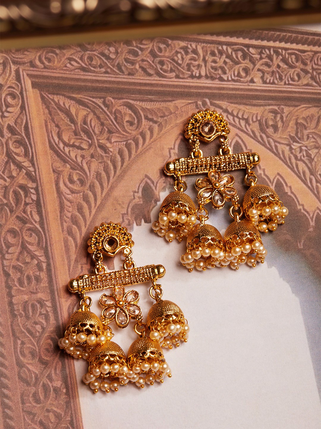 

Rubans Gold-Plated Gold-Toned Dome Shaped Jhumkas Earrings