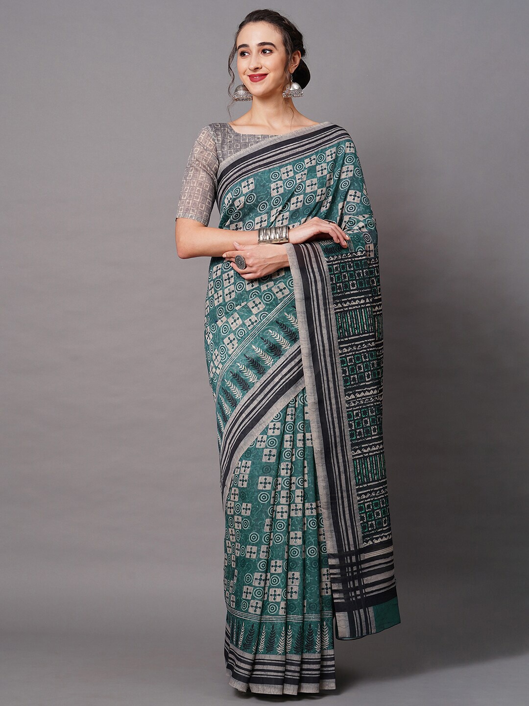 

Mitera Green & Black Ethnic Motifs Printed Art Silk Saree