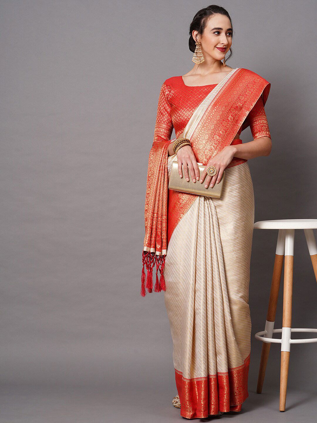 

Mitera Cream-Coloured & Red Woven Design Zari Silk Blend Banarasi Saree