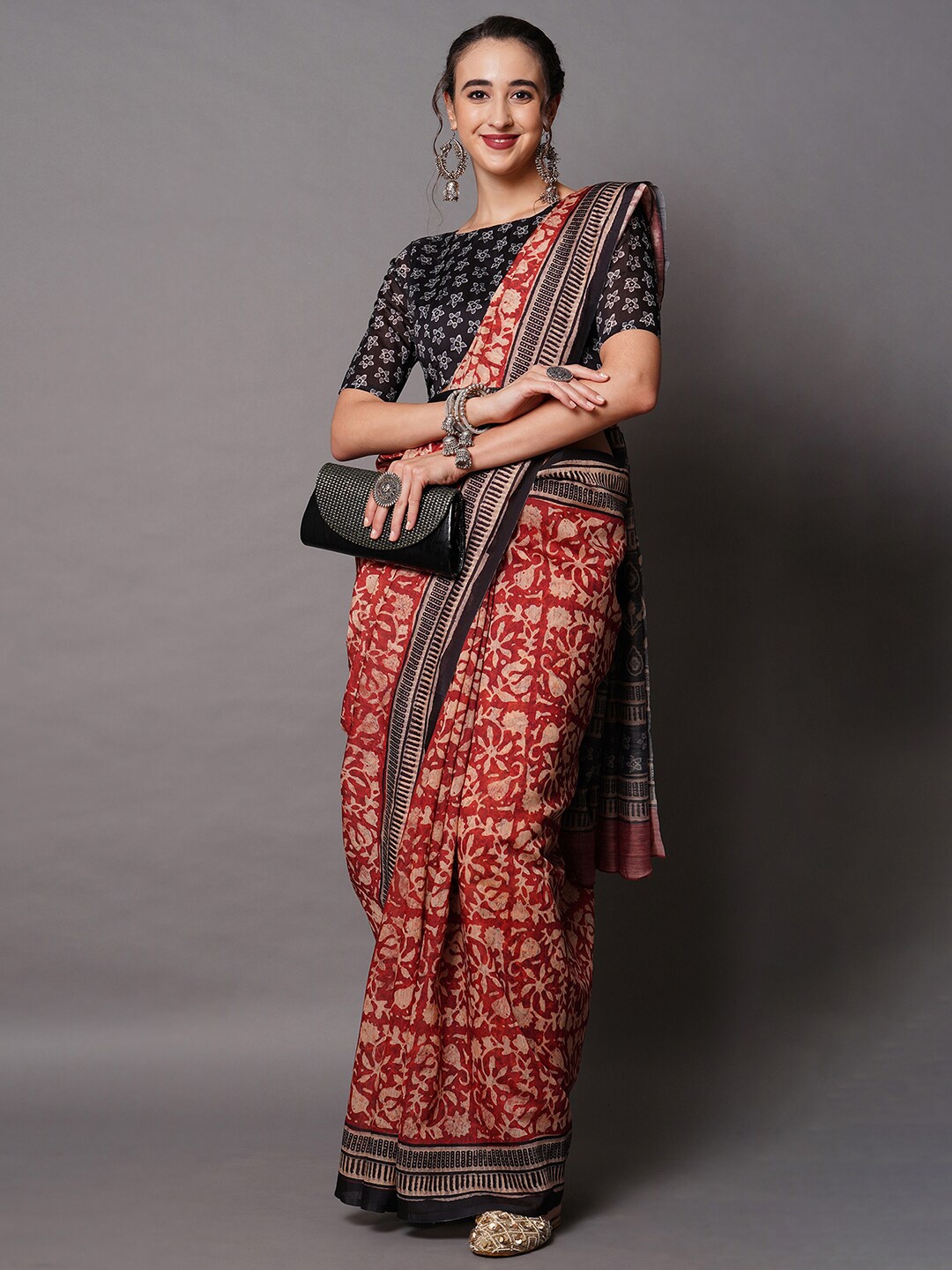 

Mitera Rust & Black Art Silk Floral Printed Saree