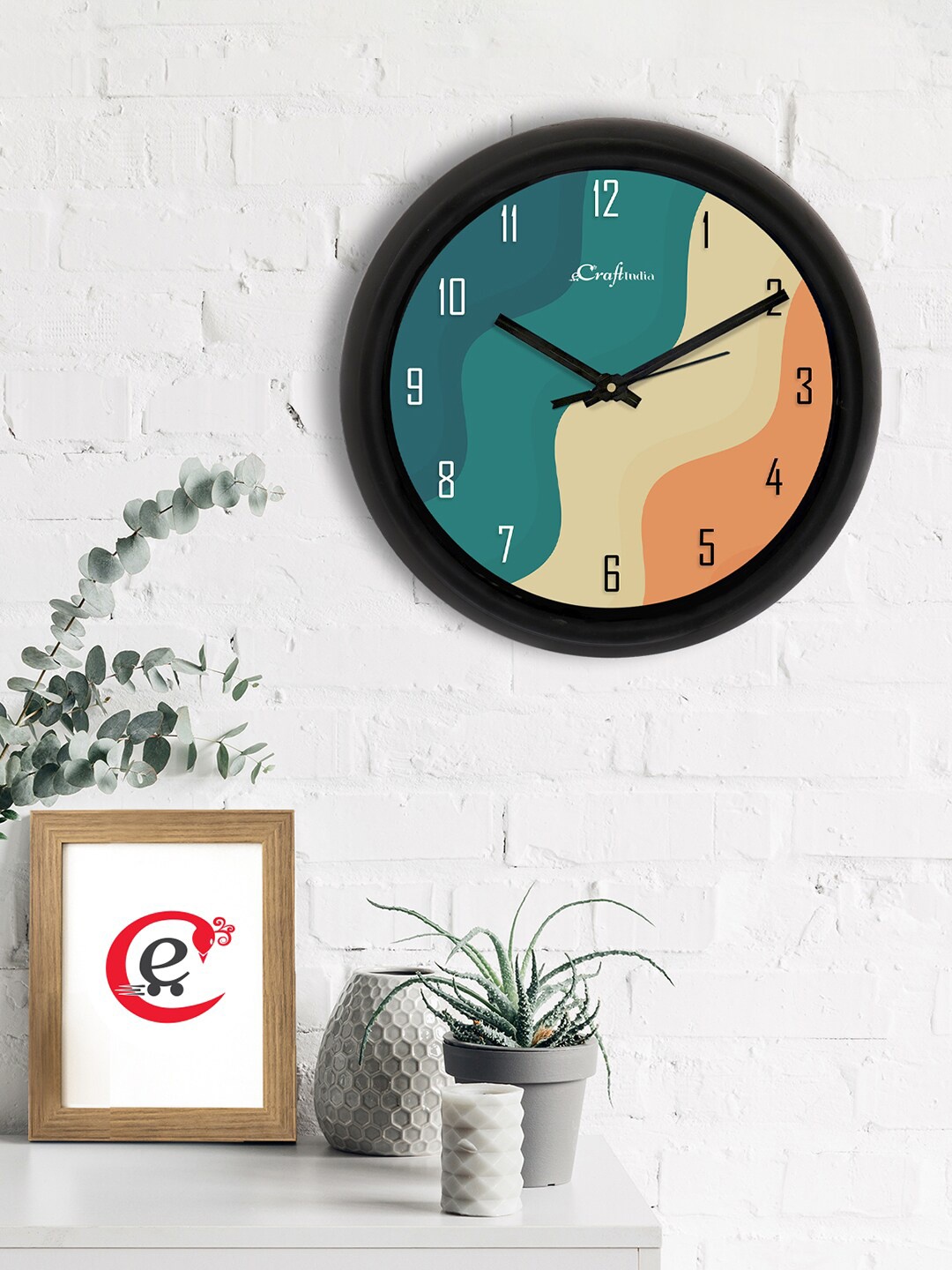 

eCraftIndia Teal & Black Printed Contemporary Analogue Wall Clock