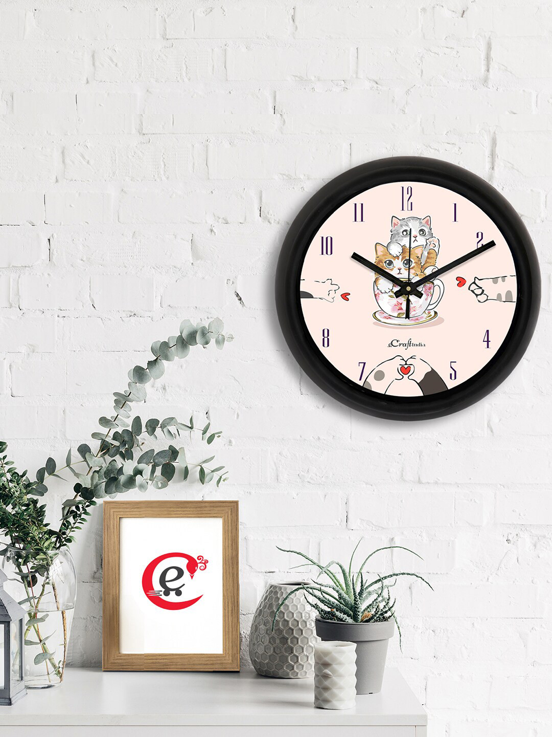 

eCraftIndia Pink & Black Printed Contemporary Analogue Wall Clock