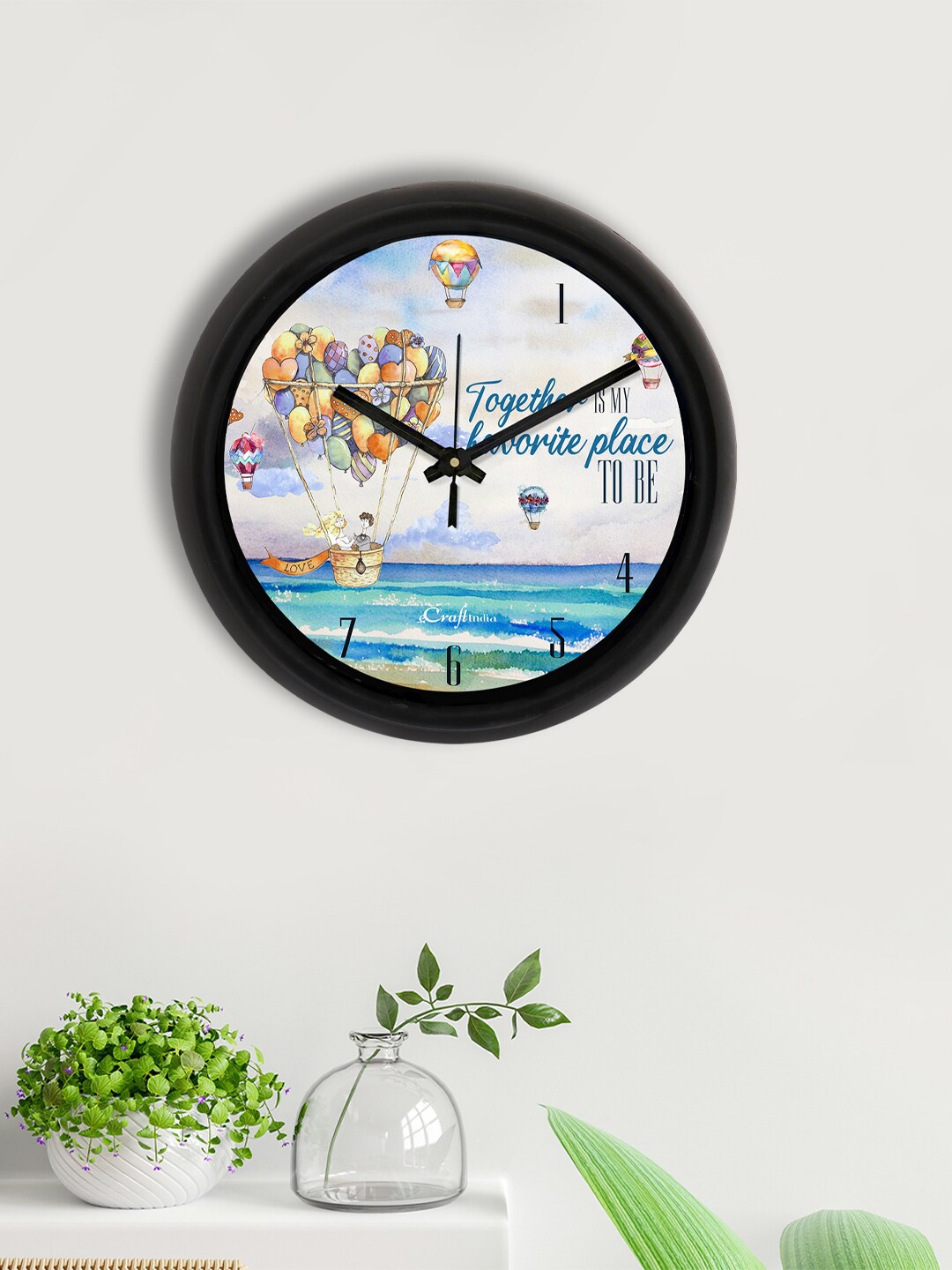 

eCraftIndia Blue & Black Printed Contemporary Analogue Wall Clock