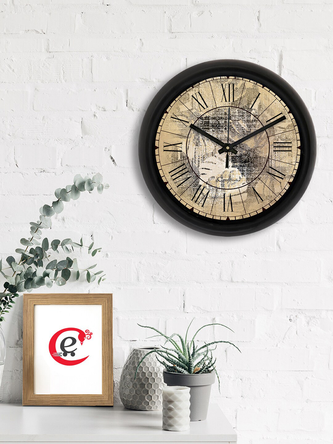 

eCraftIndia Brown & Black Printed Contemporary Wall Clock