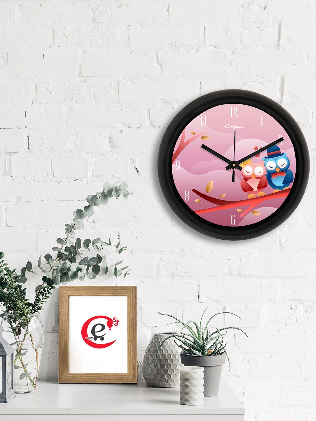 

eCraftIndia Pink & Black Printed Contemporary Analogue Wall Clock