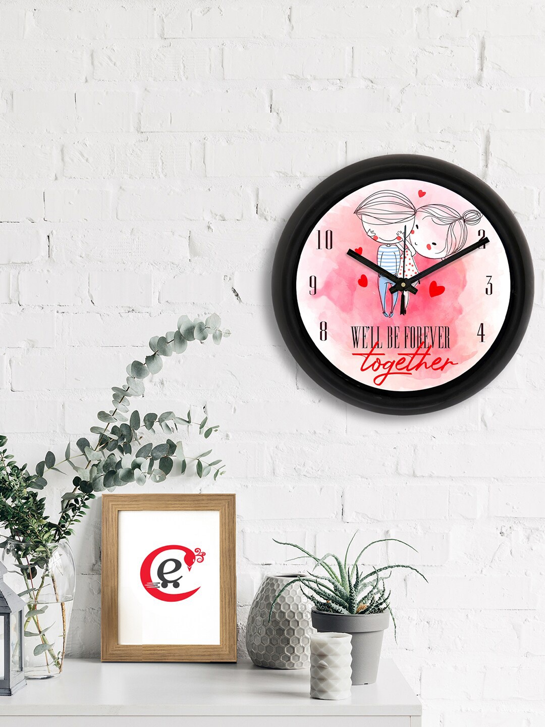 

eCraftIndia Pink & Black Printed Contemporary Analogue Wall Clock