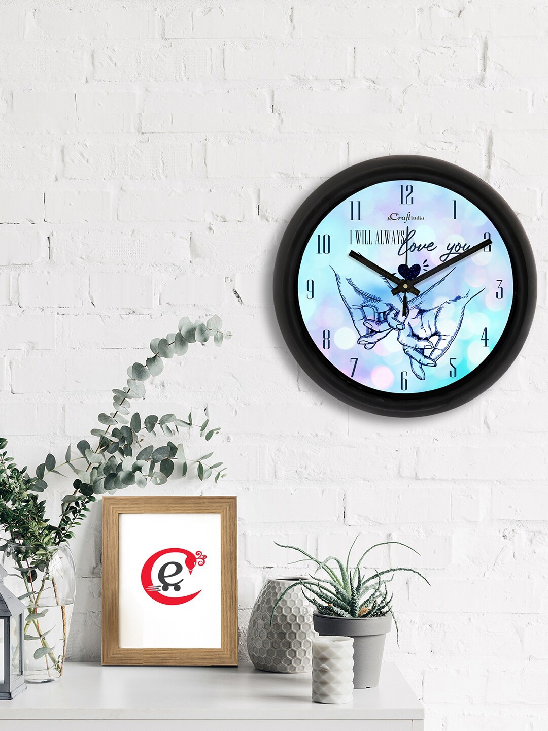 

eCraftIndia Blue & Black Printed Contemporary Wall Clock