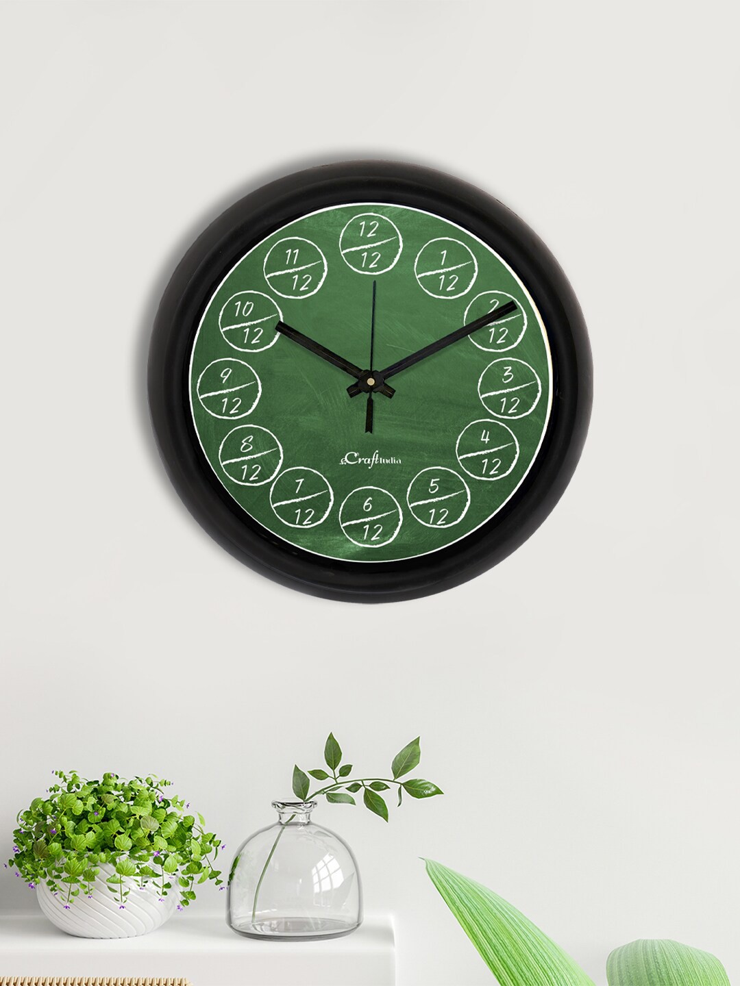 

eCraftIndia Green & Black Printed Contemporary Wall Clock