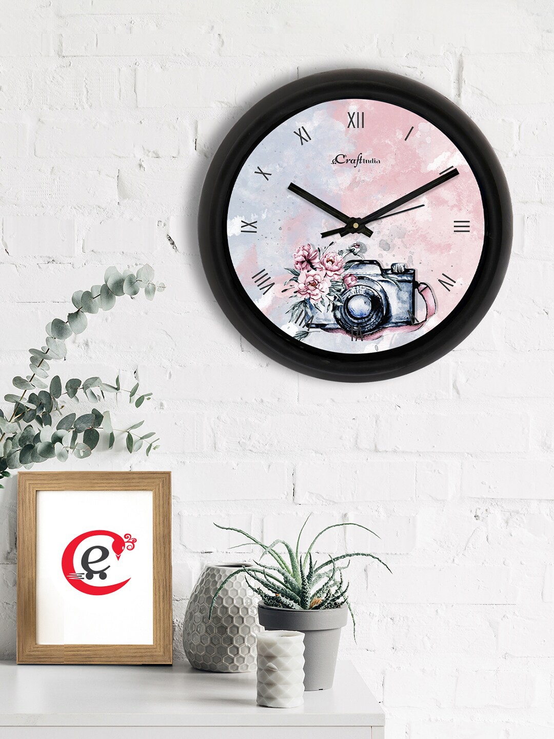 

eCraftIndia Pink & Black Printed Contemporary Wall Clock