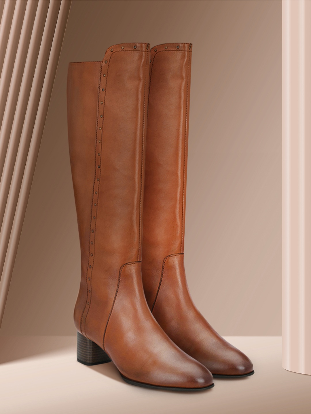 

Delize Tan Solid High-Top Party Block Heeled Boots