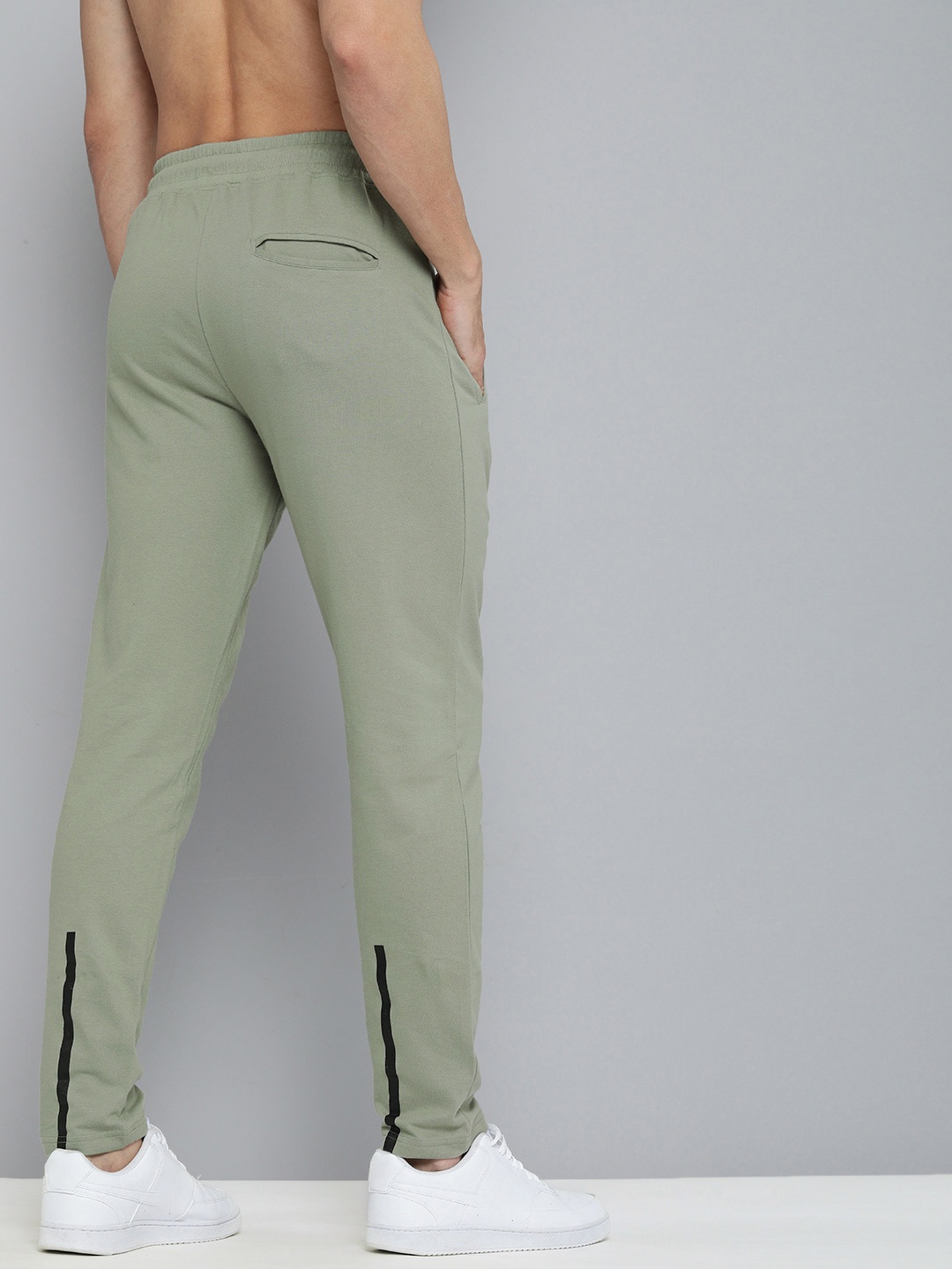

HERE&NOW Men Olive Green Solid Pure Cotton Track Pants with Striped Detailing