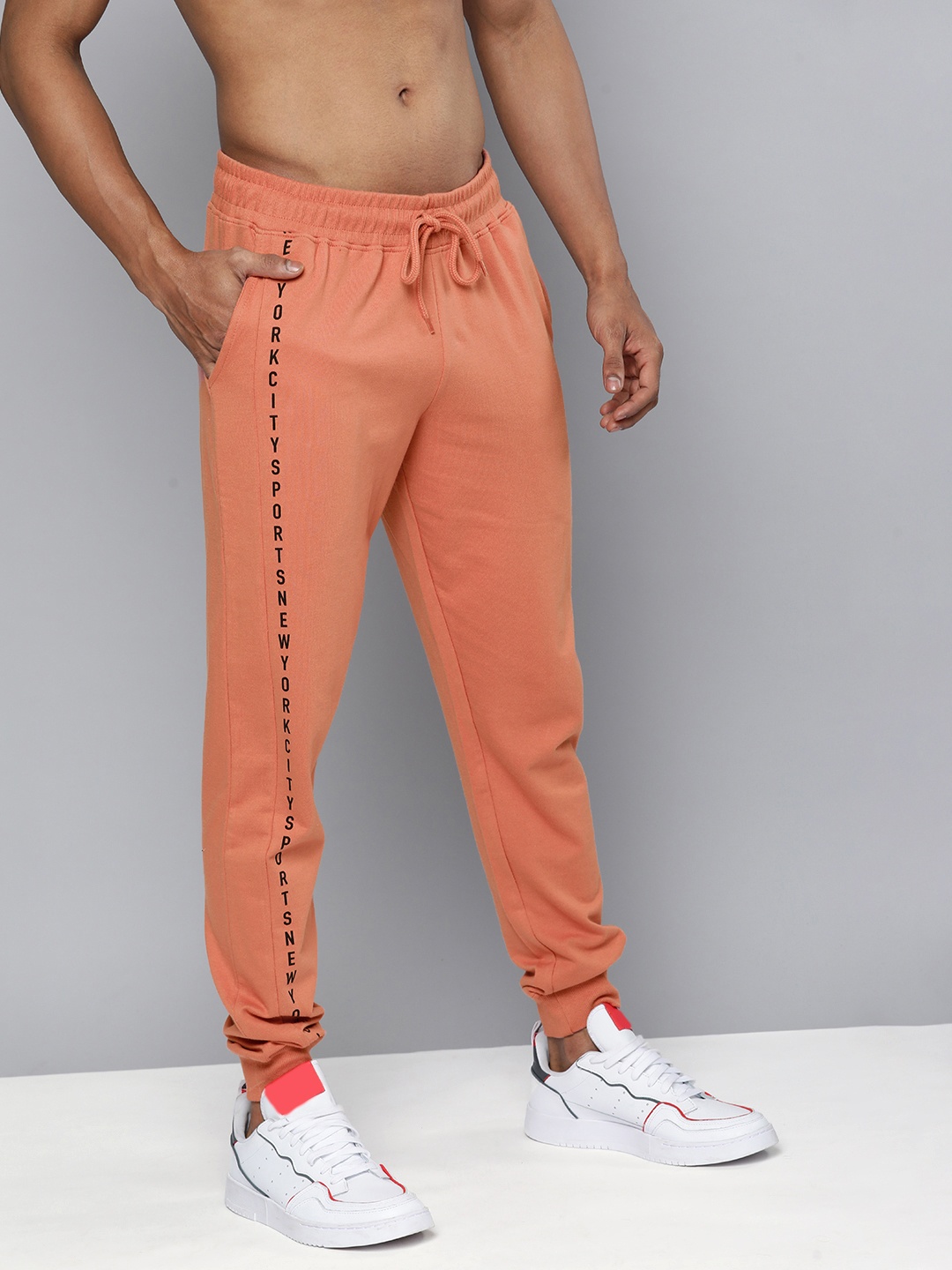 

HERE&NOW Men Orange & Black Printed Joggers