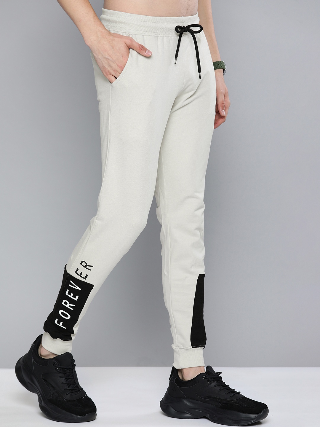 

HERE&NOW Men Mineral Grey Solid Pure Cotton Slim Fit Joggers with Cut & Sew Printed Detail