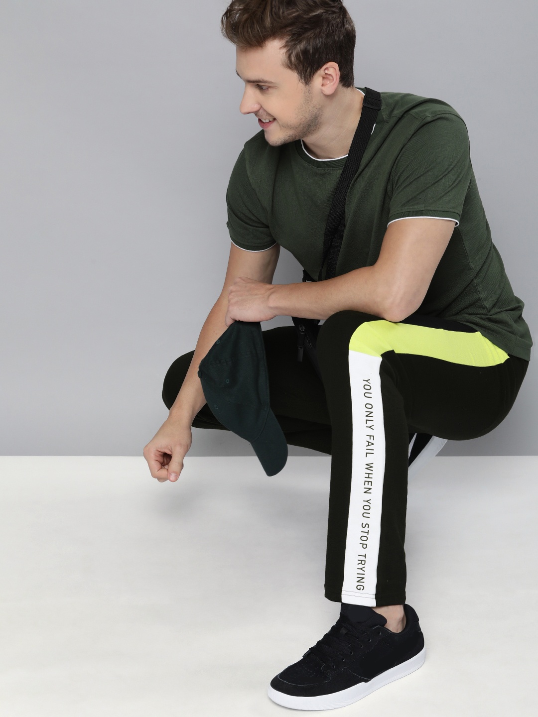 

HERE&NOW Men Black Solid Side Printed Pure Cotton Track Pants