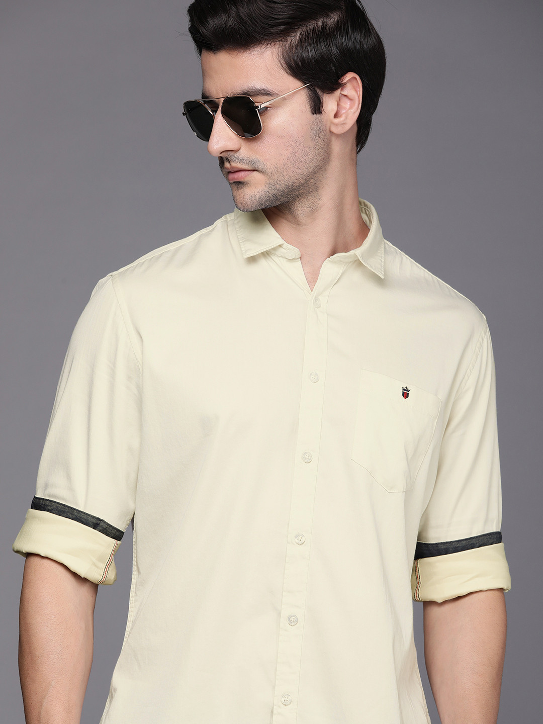 

Louis Philippe Men Solid Beige Brand Logo Shirt