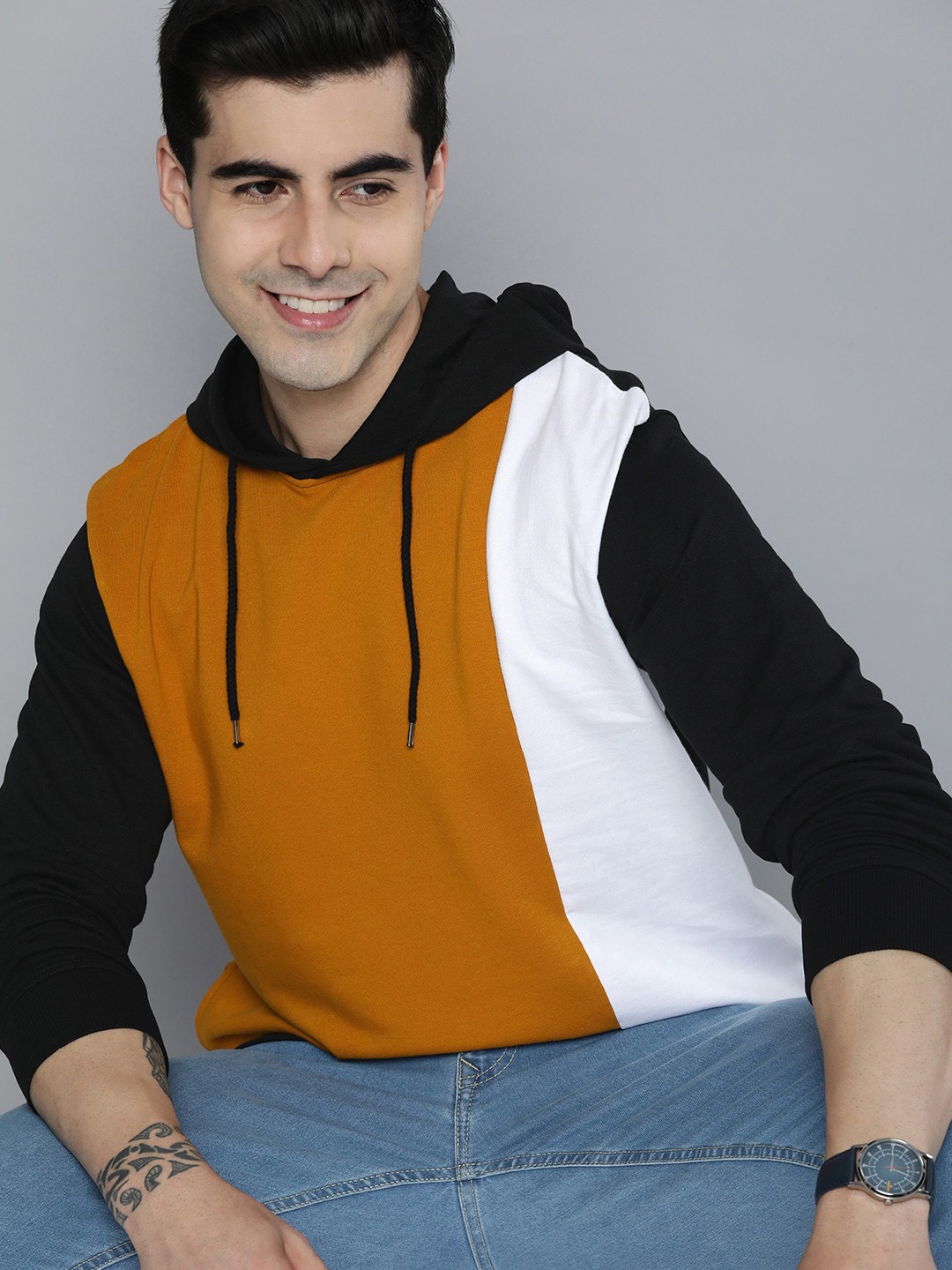 

Mast & Harbour Men Colourblocked Pure Cotton Hooded Sweatshirt, Mustard
