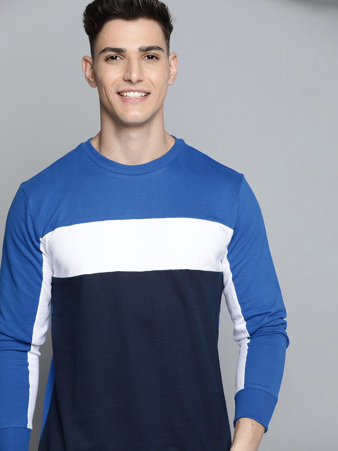 

Mast & Harbour Men Navy Blue & White Pure Cotton Colourblocked Sweatshirt