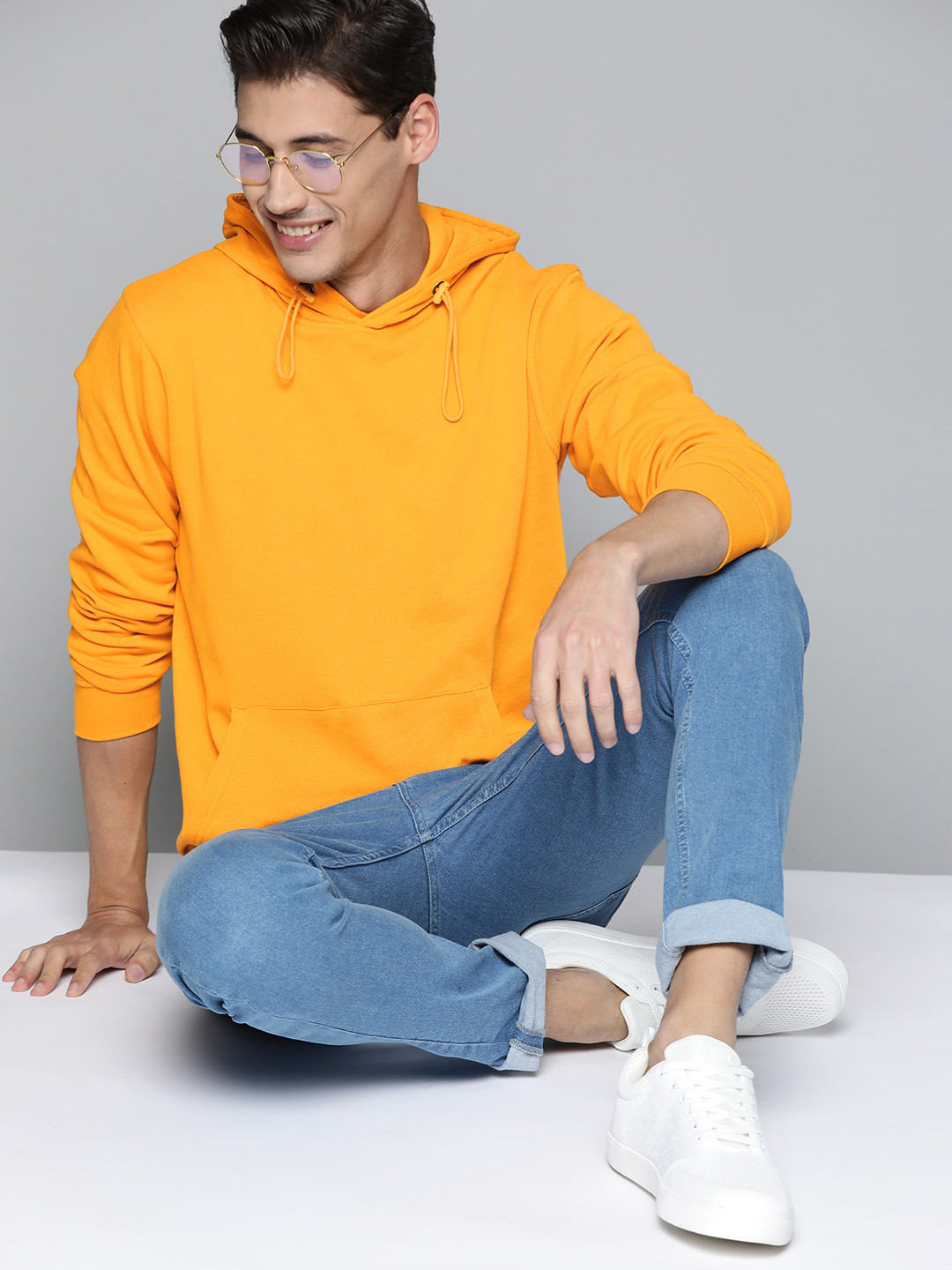 

Mast & Harbour Men Mustard Yellow Hooded Sweatshirt