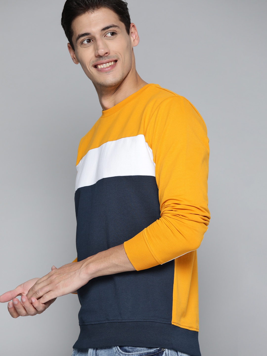 

Mast & Harbour Men Yellow & Navy Blue Pure Cotton Colourblocked Sweatshirt