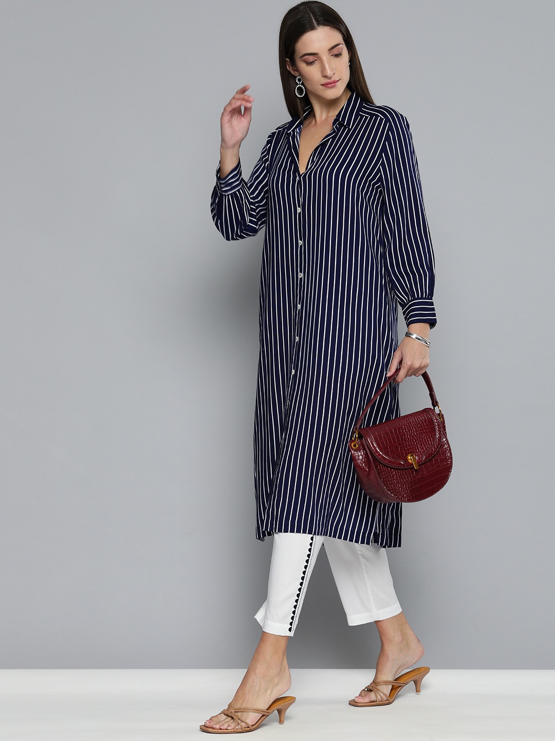 

Modern Indian by CHEMISTRY Women Navy Blue Striped Regular Kurta with Trousers