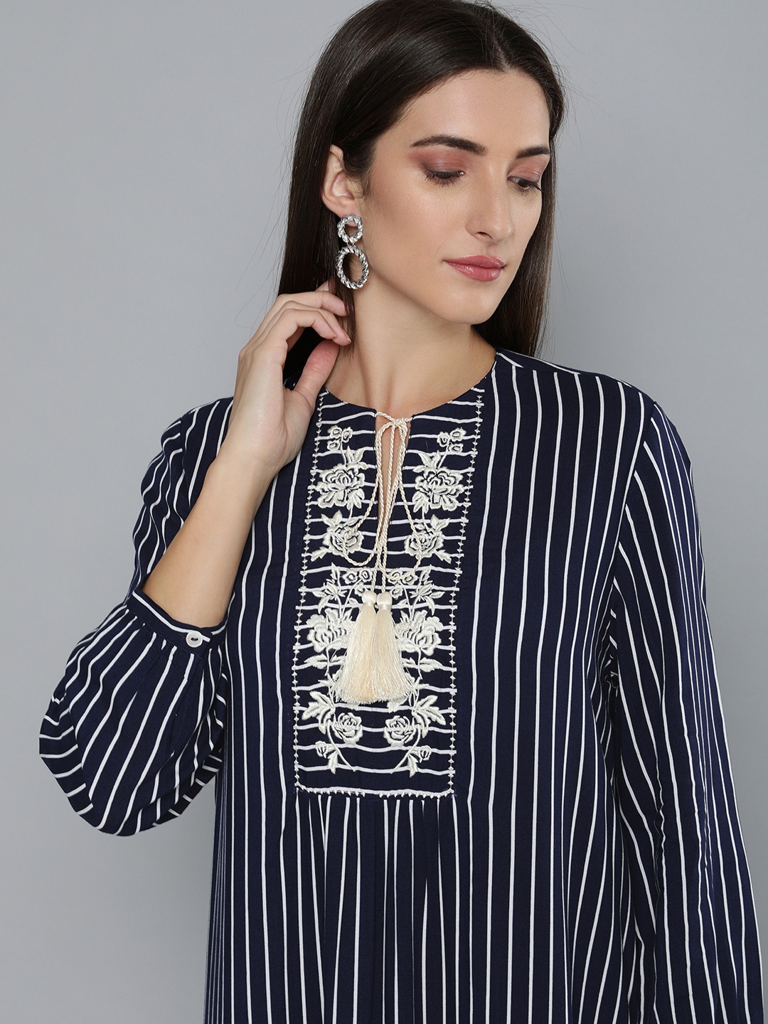 

Modern Indian by CHEMISTRY Women Navy Blue Striped Regular Kurta with Palazzos