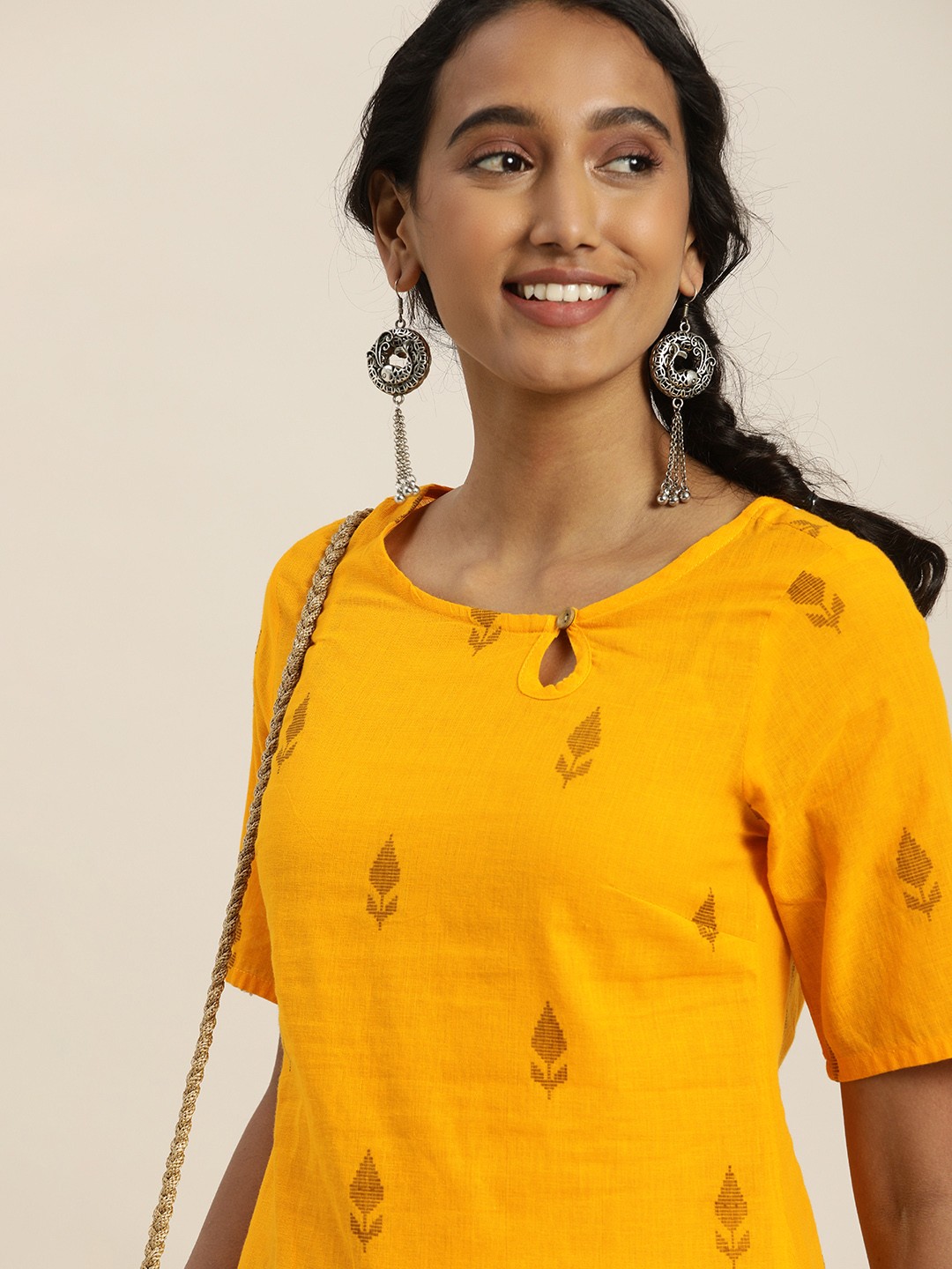 

Taavi Women Yellow & Brown Woven Legacy Pure Cotton Sustainable Straight Kurta