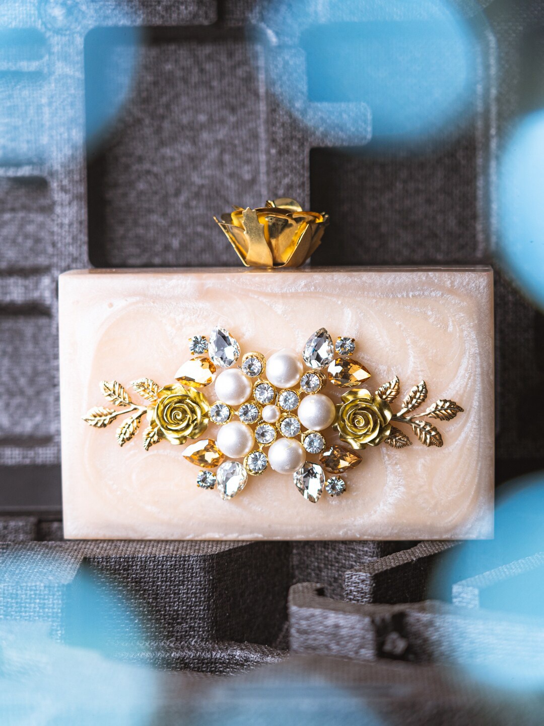 

NR By Nidhi Rathi Peach-Coloured & White Embellished Box Clutch